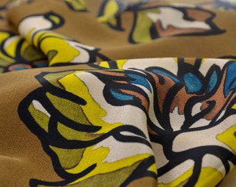 Evening wear pure silk patterned with flowers in brown, yellow - 140 cm wide - fabric smooth patterned