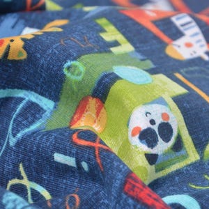 Children&#39;s jersey blue with letters, animals and cars, blue, red, green, yellow - 160 cm wide - smooth fabric, animals