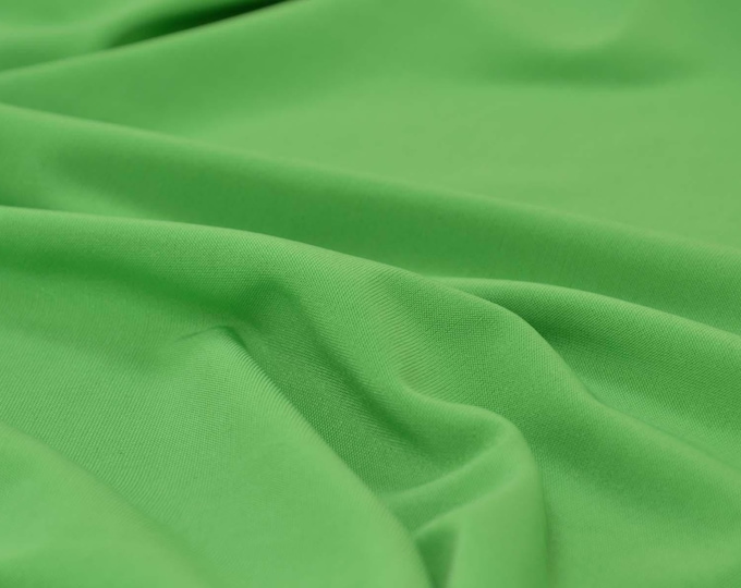 Viscose and Lycra jersey in green, suitable for bikinis, T-shirts, and sportswear - 130 cm wide - smooth fabric, solid color
