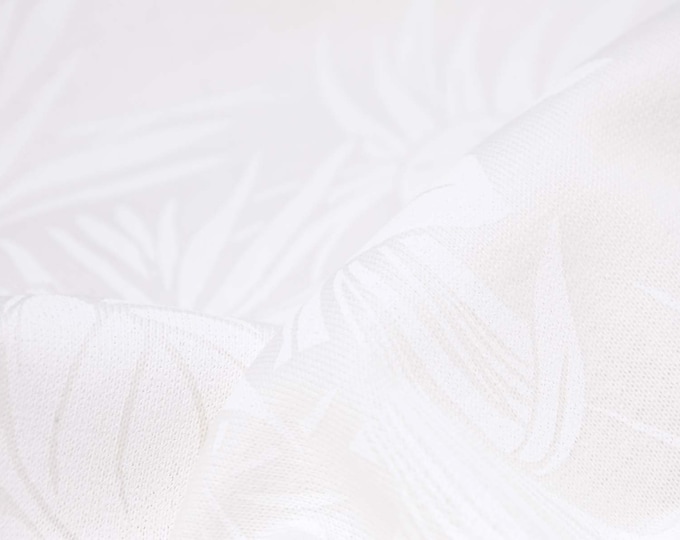 Sweatstoff aus Baumwolle mit Blumen, Blättern in weiß, eierschale - 180cm breit - Stoff leicht glänzend, gemustert