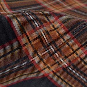 Trouser fabric stretch with check in orange - 150 cm wide - fabric smooth checks