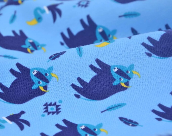 Children's jersey interlock fabric in light blue with dark blue bison print, made of cotton - 140 cm wide - patterned fabric, animals