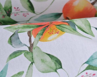 May include: White fabric with a repeating pattern of green leaves, orange and yellow citrus fruit, and pink blossoms.