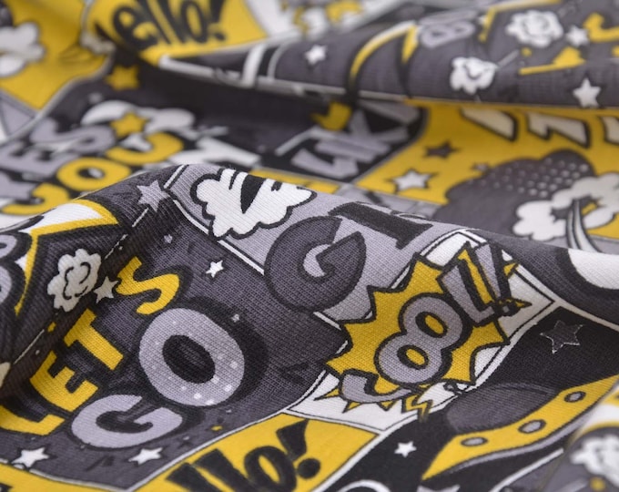 Kinderjersey mit Comicmuster in grau, gelb, weiß aus Baumwolle - 165cm breit - Stoff matt, gemustert