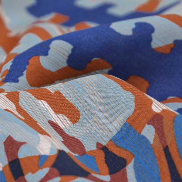 Blouse fabric made of viscose, shiny with abstract pattern in blue - 140 cm wide - patterned fabric