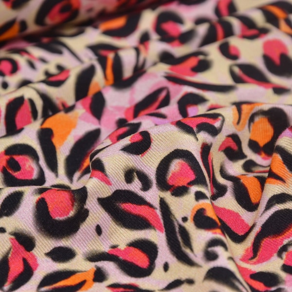 Jersey made of viscose with Leo print in pink, orange from Hilco Fashion Trends - 150 cm wide - fabric patterned, Leo