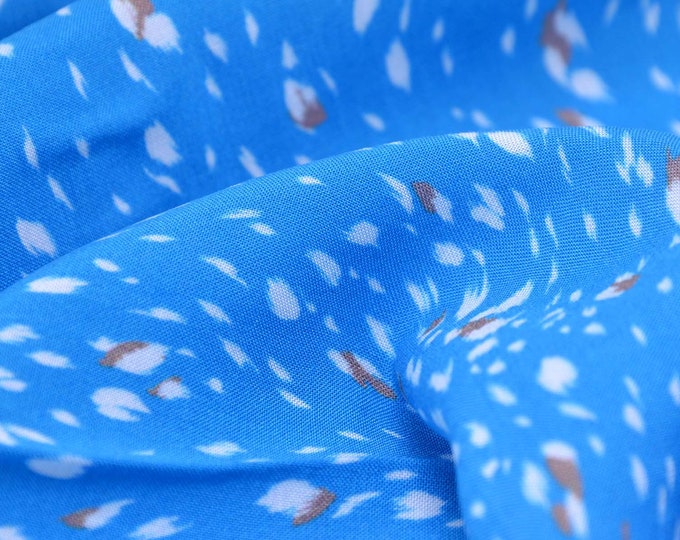Viscose blouse fabric in blue with white and brown spots - 140 cm wide - smooth fabric, dots
