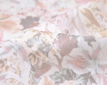 May include: White fabric with a delicate floral pattern in shades of pink, brown, and green. The fabric has a subtle texture and a soft, flowing drape.