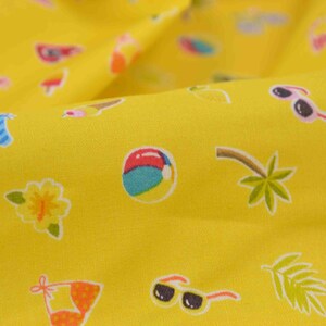 May include: Yellow fabric with a repeating pattern of summer-themed icons, including sunglasses, beach balls, palm trees, and swimsuits.