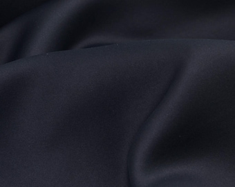 Tissu occultant noir uni pour rideaux et voilages - largeur 140 cm - tissu lisse, couleur unie