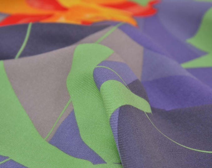 Viscose blouse fabric with large flowers in orange, yellow, green, and purple - 145 cm wide - slightly shiny, patterned fabric