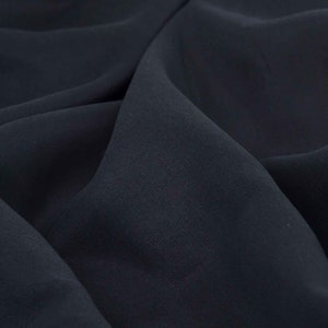 Blouse fabric woven from Tencel, plain black - 145 cm wide - smooth fabric, UNI