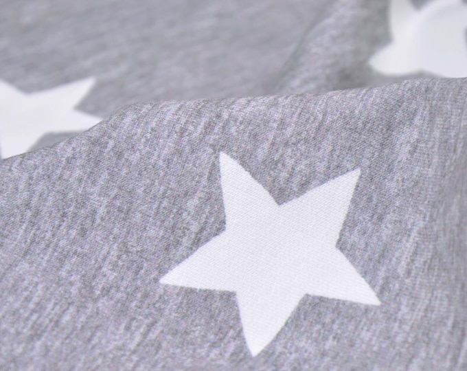 Sweatstoff in grau mit weißen Sternen aus Baumwolle - 150cm breit - Stoff zweifarbig, gemustert