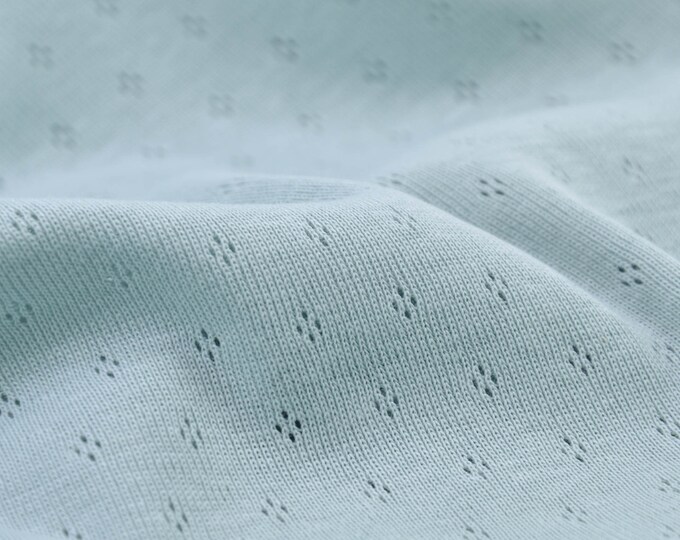 Jersey knit jersey ajour jersey hole pattern in mint - 135 cm wide - fabric smooth UNI