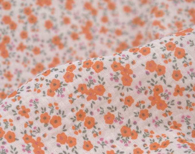 Cotton muslin with flowers in orange, beige OEKO-TEX - 130 cm wide - matt, patterned fabric
