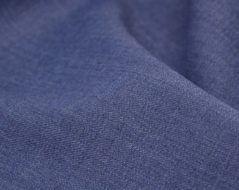 Wool stretch fabric in solid blue melange, suitable for dresses and skirts - 145 cm wide - smooth, melange fabric