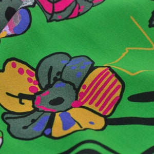 Blouse fabric Janette made of viscose in green with flowers by Hilco - 140 cm wide - patterned fabric