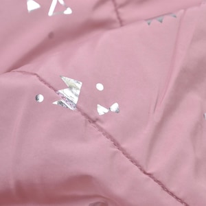 Quilted fabric pink with silver triangles for quilted jackets