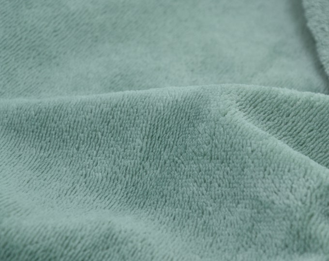 Fleece with reverse in green made of viscose, polyester and cotton