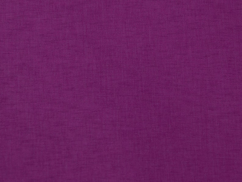 May include: A solid purple fabric with a subtle woven texture.