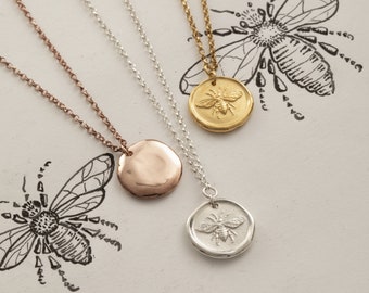 Silver and gold honey bee pendants