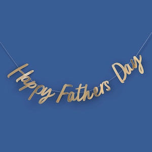 May include: Gold Happy Fathers Day banner with cursive lettering on a blue background.