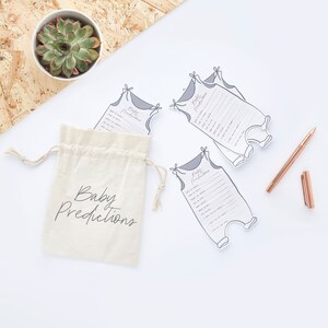 Roségoud verijdelde babyvoorspellingskaarten met schattige canvas tas