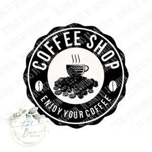 Op de afbeelding: Zwart-wit Coffee Shop logo met een koffiekopje, koffiebonen en de tekst "Enjoy Your Coffee". Het logo is cirkelvormig met een geschulpte rand en een koffieboon aan weerszijden.