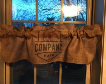 Approximately 39” wide  Farmhouse pig, pork, burlap feed sack country, valance / curtain.