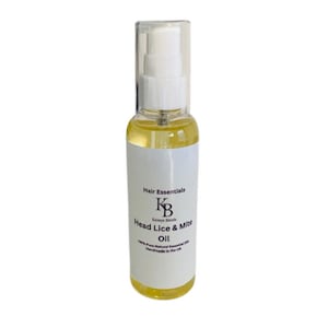 May include: A clear glass spray bottle containing yellow oil. The bottle features a white label with black text: "Hair Essentials Head Lice & Mite Oil". It has a clear plastic cap and a white spray nozzle. Handmade in the UK.