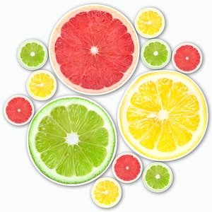 May include: A colourful arrangement of citrus fruit slices, including grapefruit, lemons, and limes, against a white background. The image showcases the juicy interiors of the fruits, with a focus on their textures and bright hues. The composition is a mix of large and small slices.