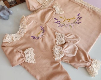 Baby girl romper and blanket