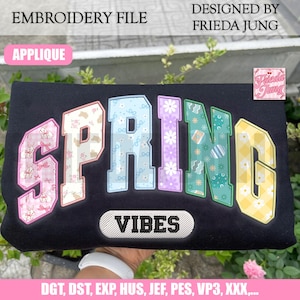 May include: Black t-shirt featuring the word "SPRING" in a vibrant, patterned design. The letters are filled with various patterns, including bunnies, flowers, and Easter eggs. The word "VIBES" is embroidered below. The design is labelled "EMBROIDERY FILE" and "APPLIQUE".