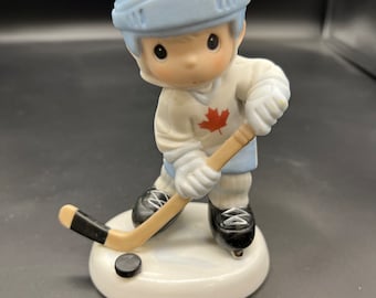 Vintage Precious Moments Canadian Exclusive “Let’s Keep Our Eye’s On The Goal, 1998 Enesco, 549975, Boy Playing Hockey, Super Cute Sold