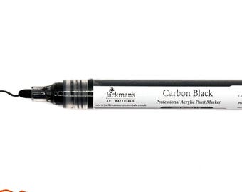 May include: A black Jackman's Carbon Black professional acrylic paint marker with a clear barrel. The marker is shown with a black line drawn from the tip. The text on the marker reads "Carbon Black" and "Professional Acrylic Paint Marker."