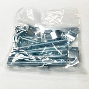 May include: A clear plastic bag filled with silver metal hardware, including screws, brackets, and nuts.
