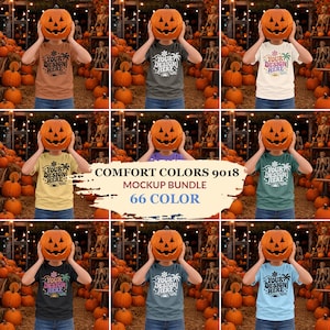 May include: A t-shirt mockup bundle featuring various colors, each displaying a graphic with a palm tree, sun, and the text YOUR DESIGN HERE. The shirts are worn by a person holding a jack-o'-lantern pumpkin in front of their face.