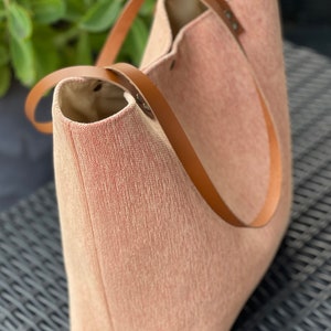 Pastel peach colored fabric bag, zippered pocket, leather handle image 4