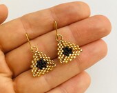 Handmade seed bead drop earrings.