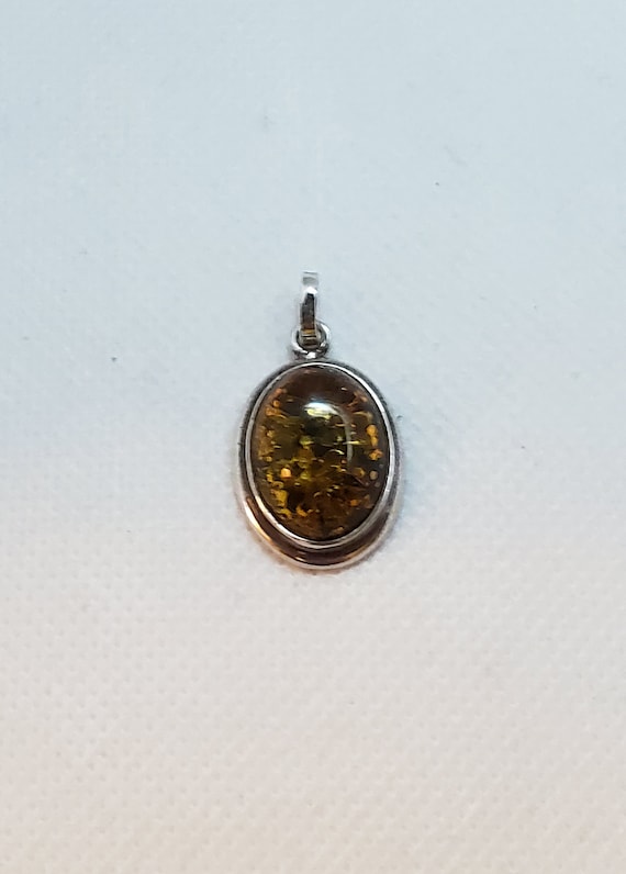 Vintage Turkish amber and silver pendant