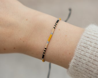 Colorful beaded bracelet "Safari" made of Miyuki Delica glass beads with macrame knots