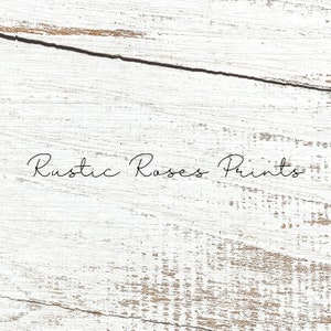 May include: Whitewashed wood background with the text "Rustic Roses Prints" in black cursive writing.