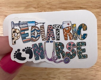 May include: A white sticker with the words "PEDIATRIC NURSE" in colorful letters. The letters are decorated with animal print patterns and medical symbols, including a stethoscope, a syringe, and a footprint.