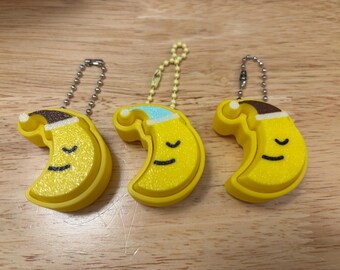 Fidget clicker a forma di luna, Fidget clicker a forma di luna, Portachiavi con fidget clicker a forma di luna con sorriso