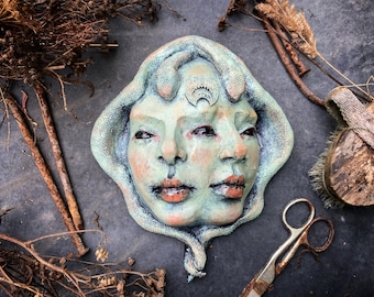 Two Faced Goddess with lunula. Feminine Wall hanging sculpture. Crying woman with emotional two faces. Emotional bas relief wall decore.