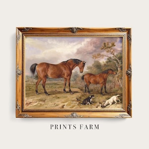 Framed painting of two brown horses standing on a grassy field, with two dogs playing nearby. The scene is set under a cloudy sky with trees in the background.