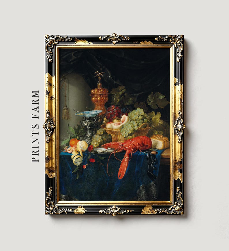 Elegant still life painting in ornate gold frame. Features lobster, fruit, and wine on blue cloth, conveying opulence and abundance.