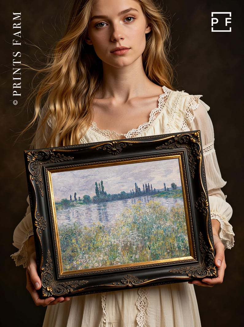 Woman in a white dress holds a framed painting of a serene riverside landscape with trees and wildflowers, evoking a calm and reflective mood.