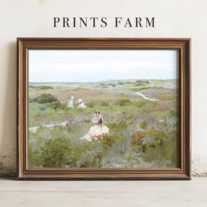 May include: A framed landscape painting with a vintage aesthetic. The artwork depicts a field of green and purple vegetation, with figures in white dresses and hats. The text "PRINTS FARM" is at the top of the frame.