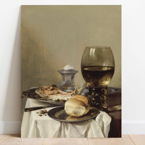 A classic still life painting features a glass of wine, bread roll, oysters, and fish on a richly draped table. The mood is tranquil and elegant.